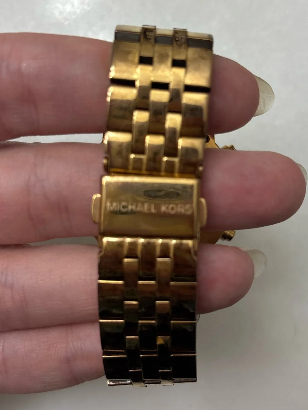 Michael Kors Women's Gold Chronograph Watch with a Pearl Face and White Dial